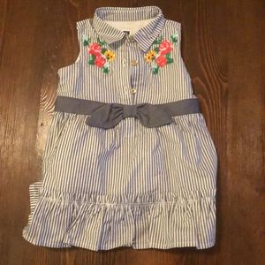 Striped dress with flowers embroidered